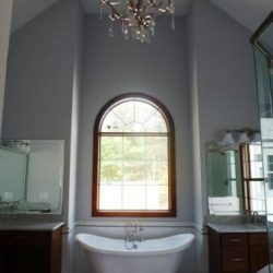 Large custom bathroom with vaulted ceiling