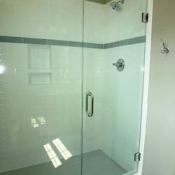 Large glass shower with custom tile work