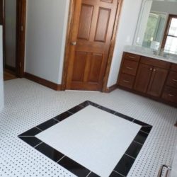 Detailed tile flooring in master bathroom
